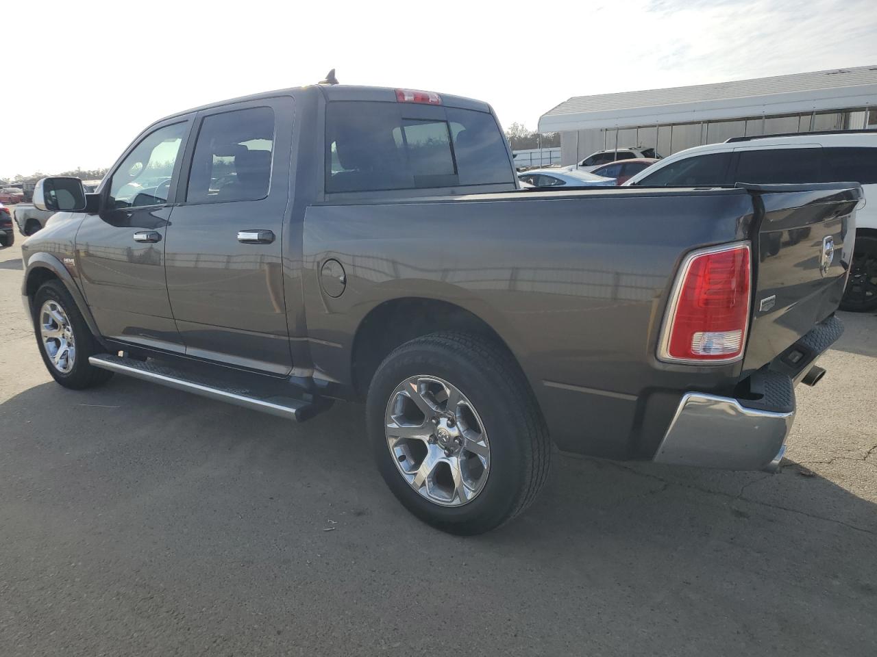 2016 Ram 1500 Laramie VIN: 1C6RR6NT4GS368271 Lot: 42371405