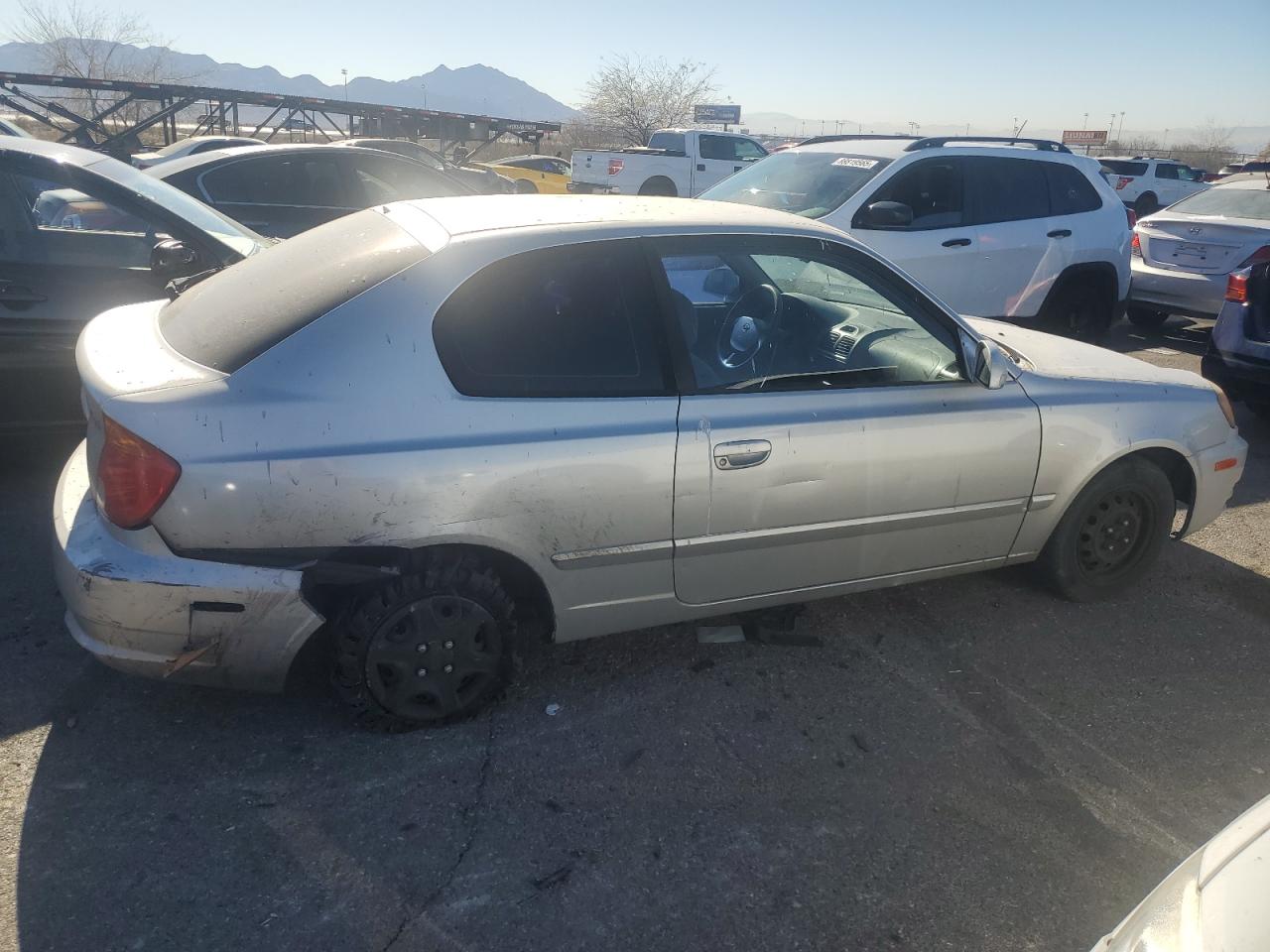 2003 Hyundai Accent Gl VIN: KMHCG35C73U263320 Lot: 88956145