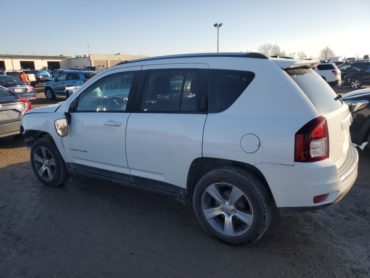 2016 Jeep Compass Latitude VIN: 1C4NJCEAXGD760798 Lot: 43959984