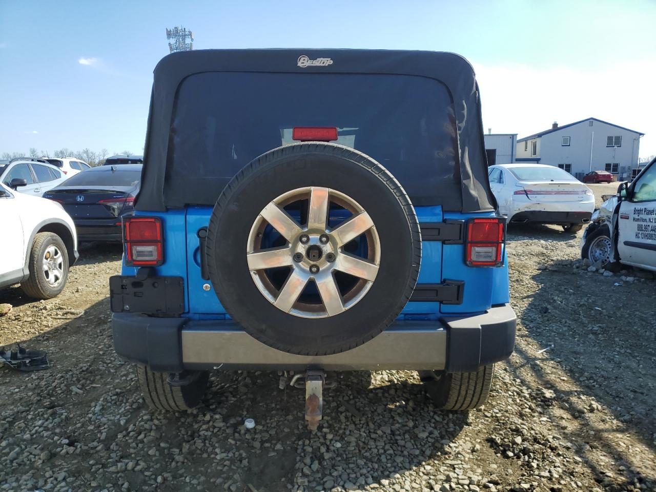 1C4BJWDG7EL169731 2014 Jeep Wrangler Unlimited Sport