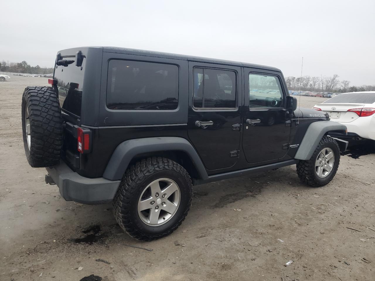 2011 Jeep Wrangler Unlimited Rubicon VIN: 1J4BA6H1XBL580097 Lot: 48696595