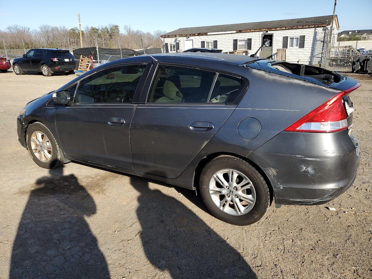 2010 Honda Insight Ex VIN: JHMZE2H77AS038898 Lot: 48396945