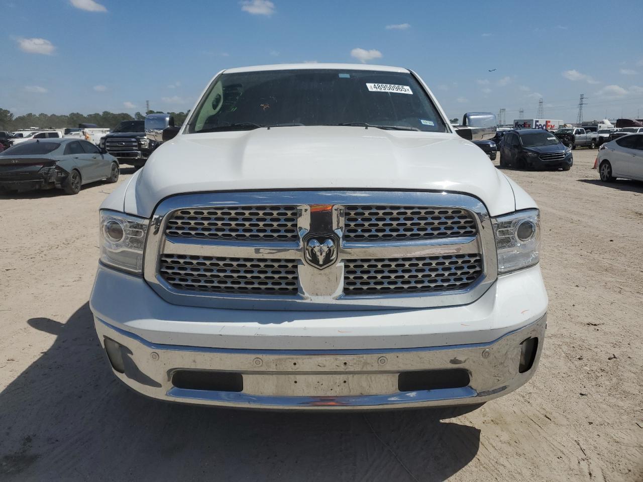 2015 Ram 1500 Laramie VIN: 1C6RR6NT7FS530649 Lot: 48950965