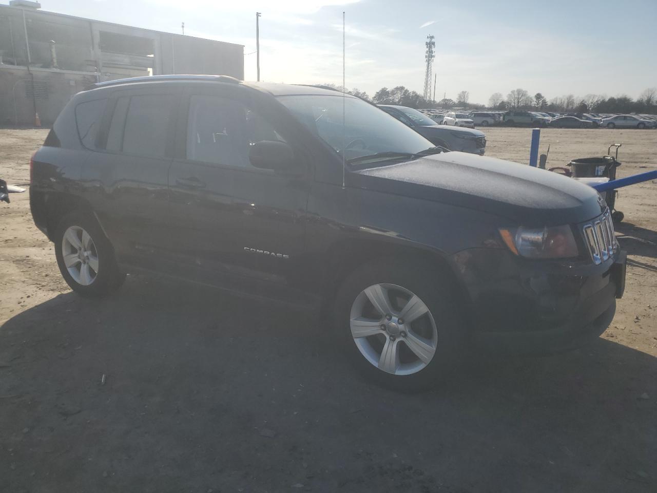 2014 Jeep Compass Latitude VIN: 1C4NJDEB7ED661562 Lot: 48931605