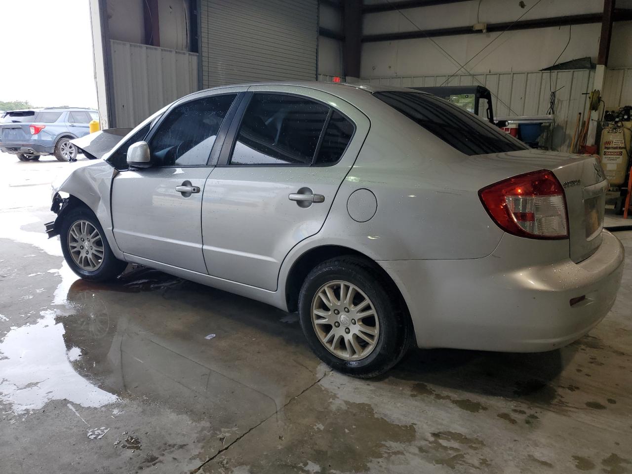 2012 Suzuki Sx4 Le VIN: JS2YC5A34C6304150 Lot: 48629255