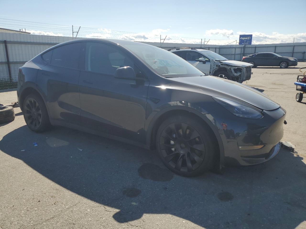 2024 Tesla Model Y VIN: 7SAYGAEE1RF988643 Lot: 48534595