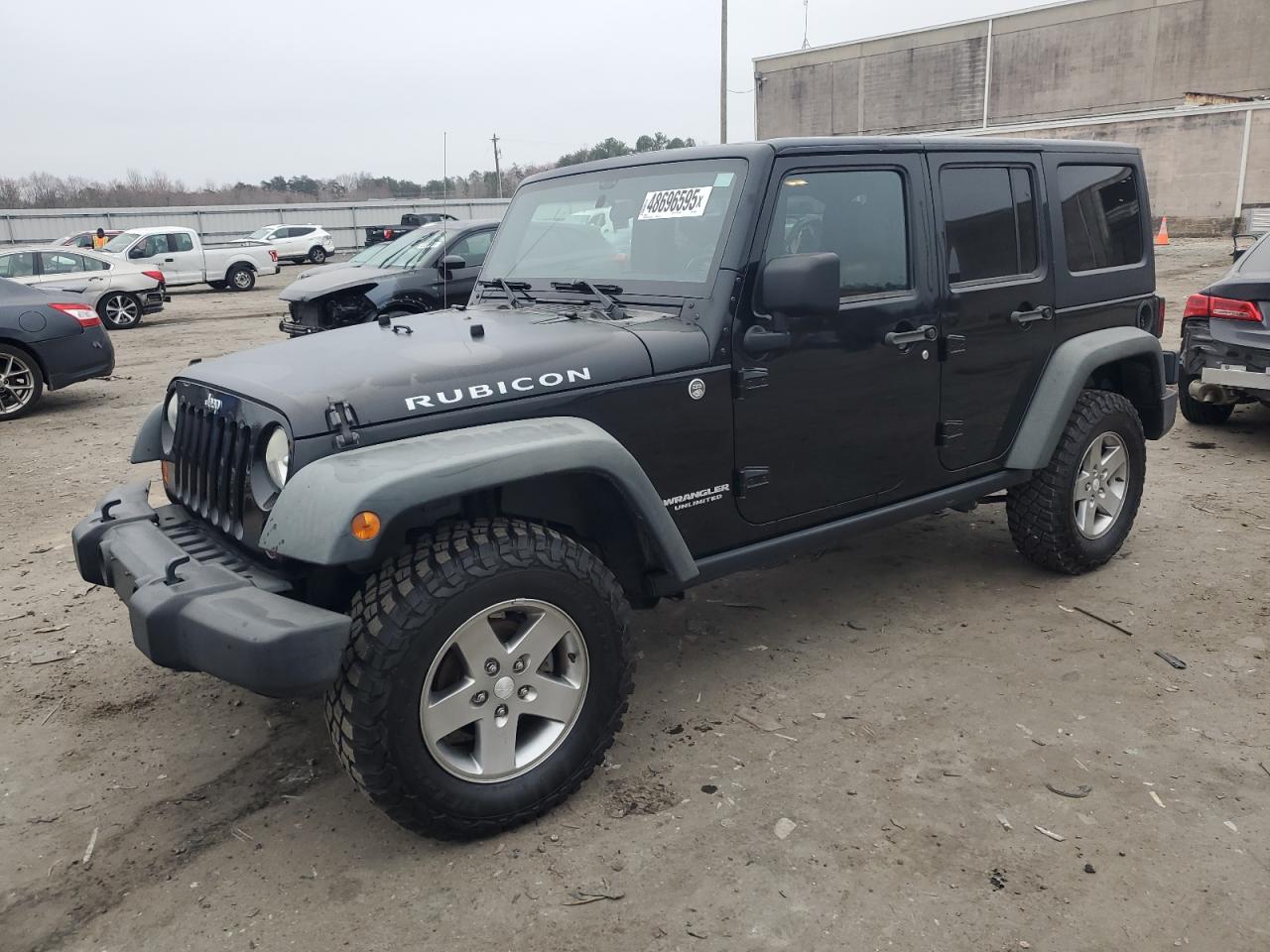 2011 Jeep Wrangler Unlimited Rubicon VIN: 1J4BA6H1XBL580097 Lot: 48696595