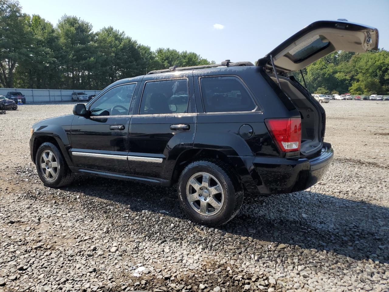 2008 Jeep Grand Cherokee Laredo VIN: 1J8GR48K18C142149 Lot: 67956904