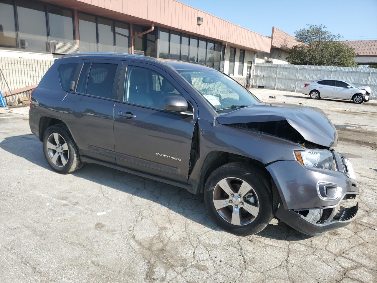 2016 Jeep Compass Latitude VIN: 1C4NJDEB1GD708104 Lot: 68420794