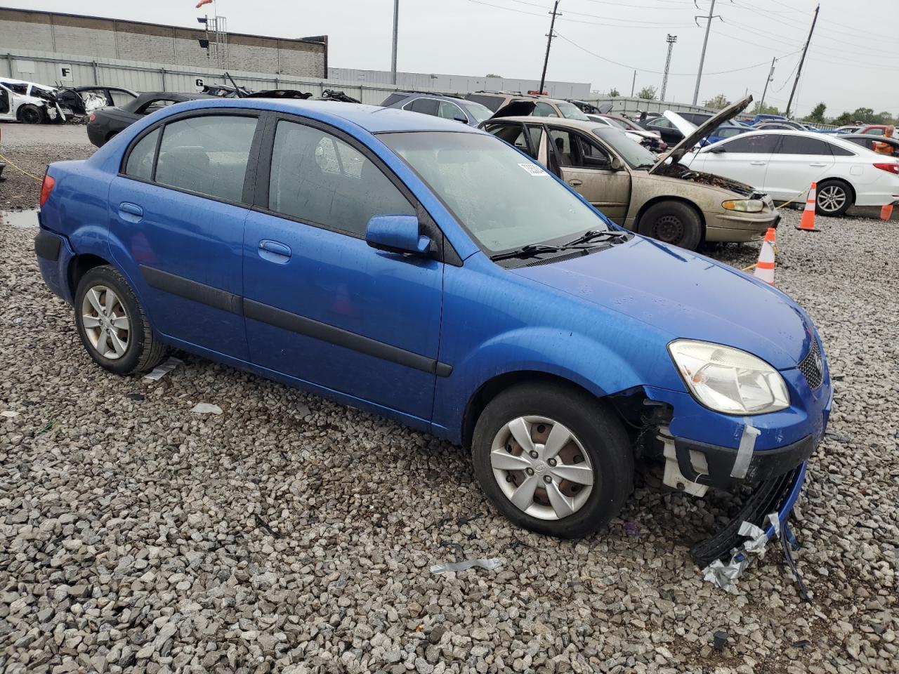 2009 Kia Rio Base VIN: KNADE223996570592 Lot: 88331875