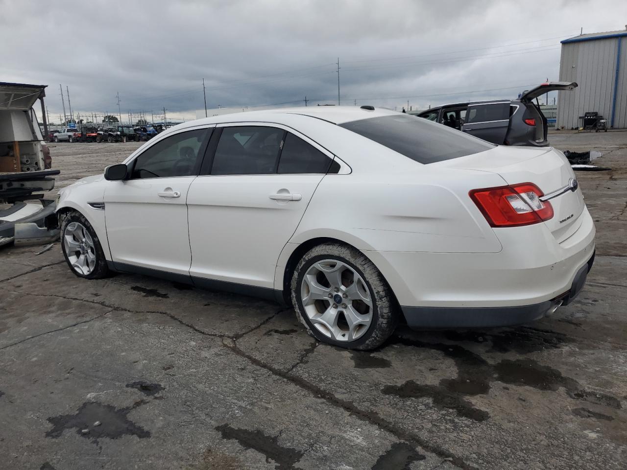 2010 Ford Taurus Sel VIN: 1FAHP2EWXAG102458 Lot: 84840454