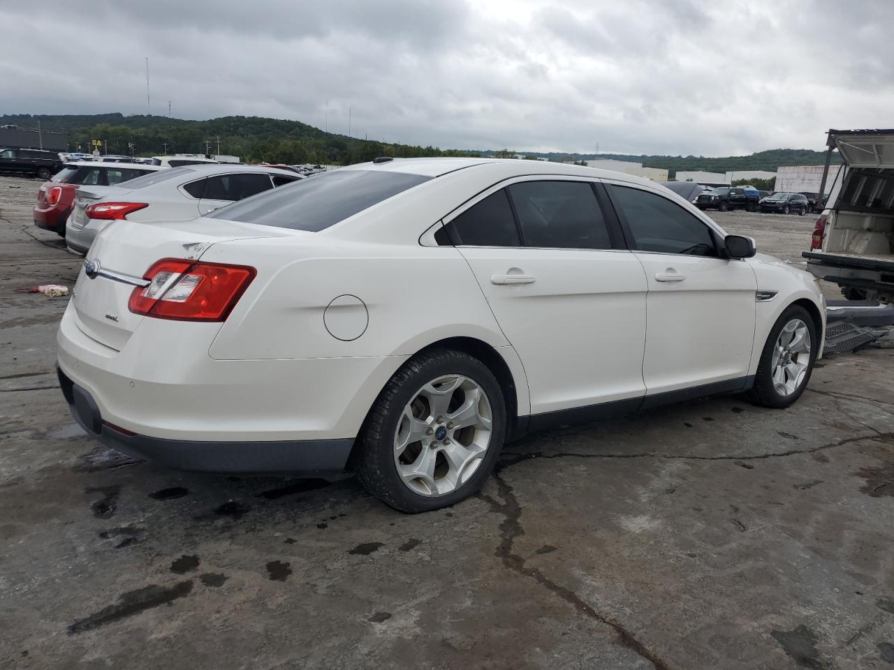 2010 Ford Taurus Sel VIN: 1FAHP2EWXAG102458 Lot: 84840454