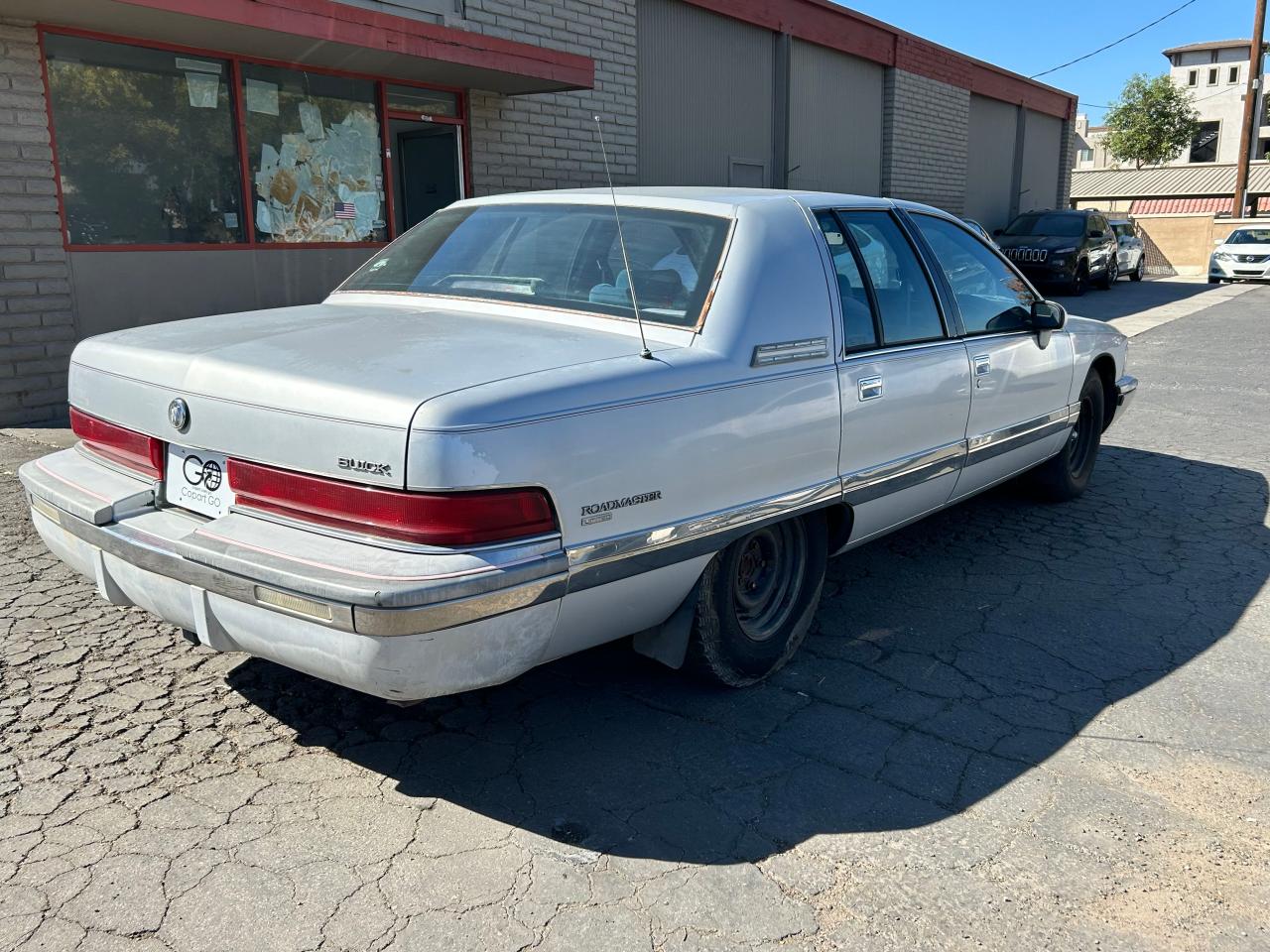 1992 Buick Roadmaster Limited VIN: 1G4BT5370NR427263 Lot: 77878424