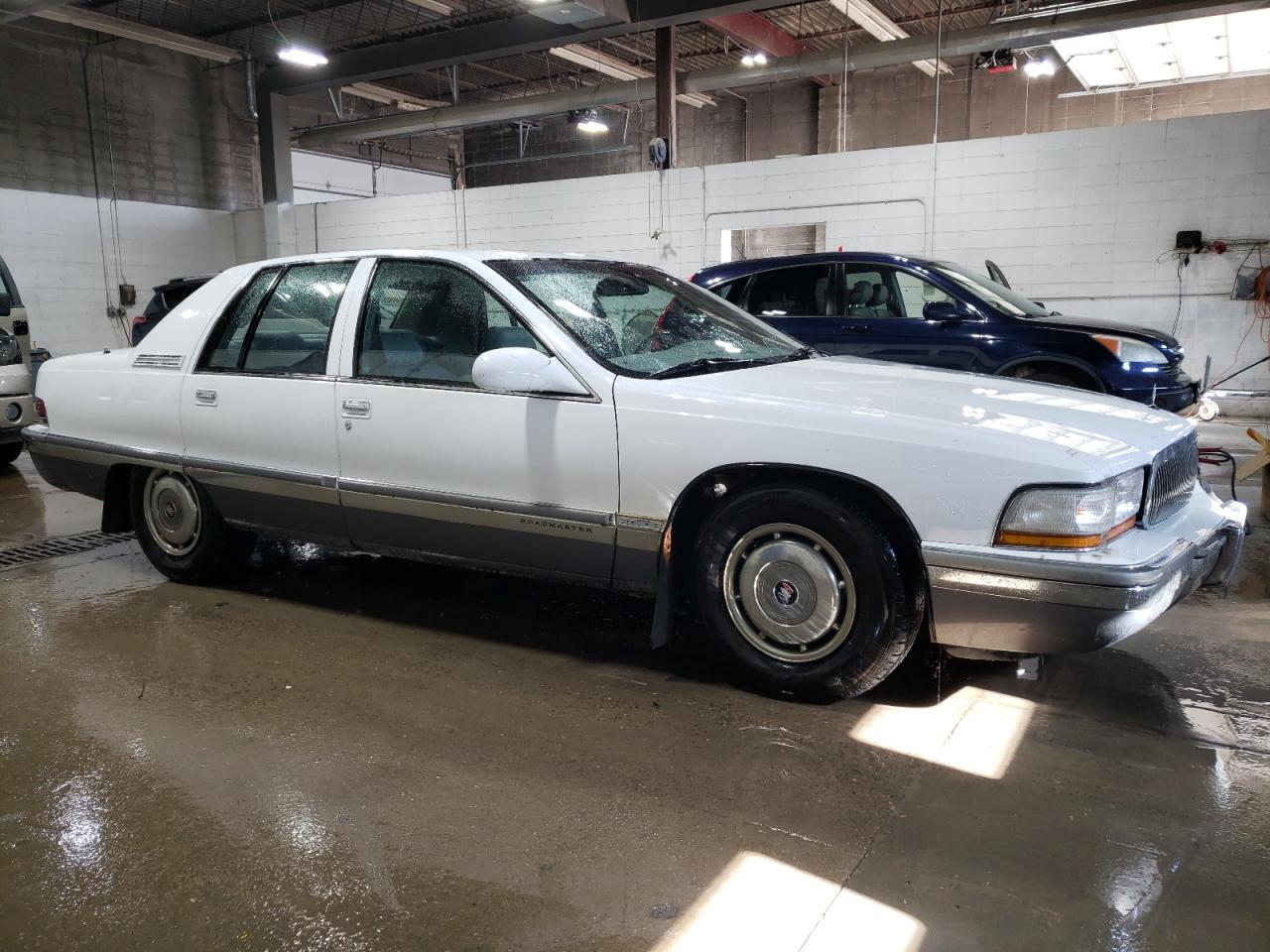 1995 Buick Roadmaster Limited VIN: 1G4BT52P1SR425910 Lot: 77498994