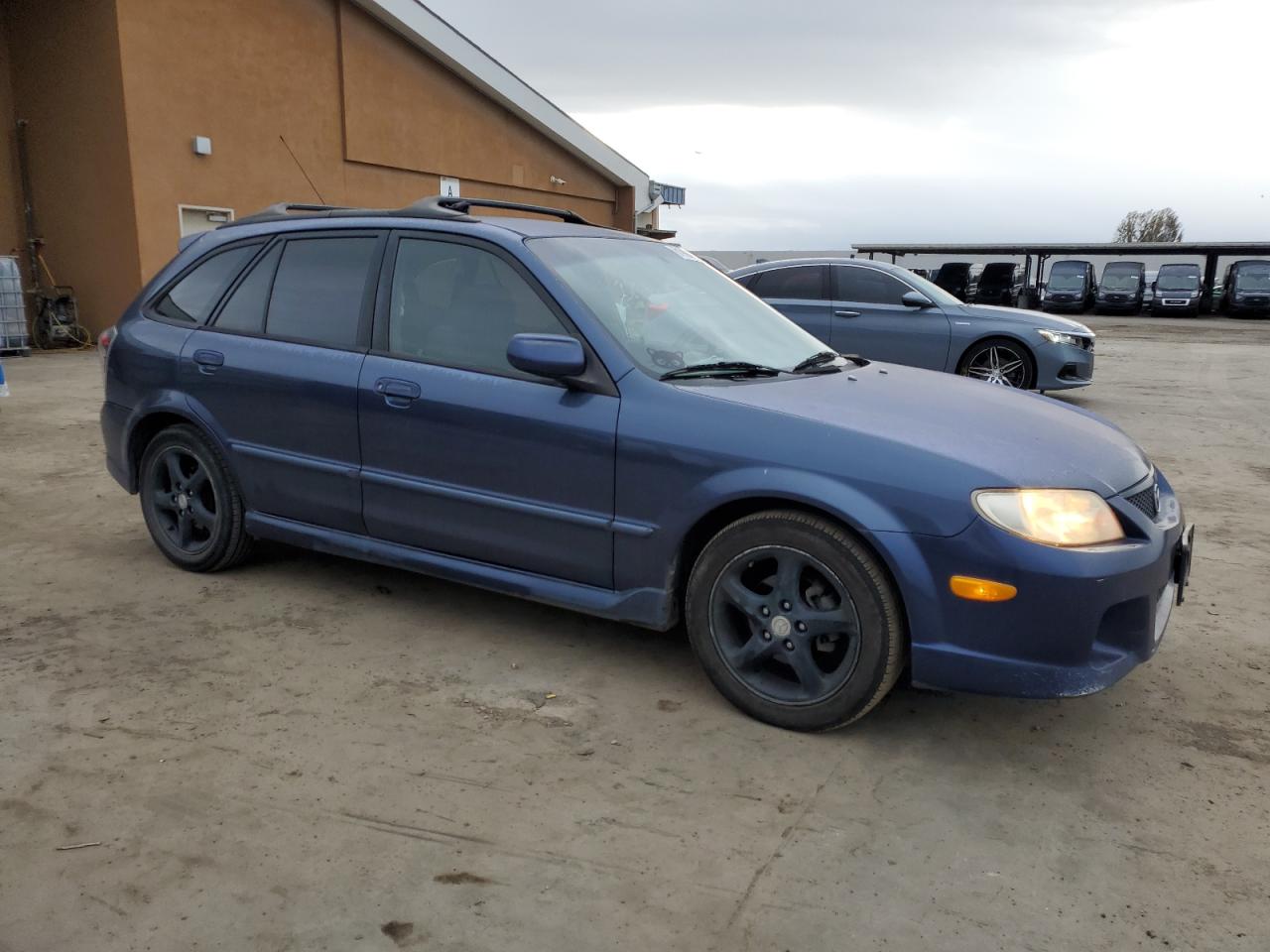 2002 Mazda Protege Pr5 VIN: JM1BJ245021530960 Lot: 81994424