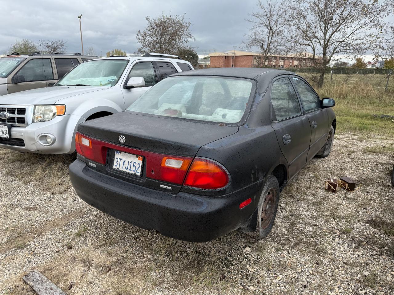 1995 Mazda Protege Dx VIN: JM1BA1419S0100163 Lot: 85915754