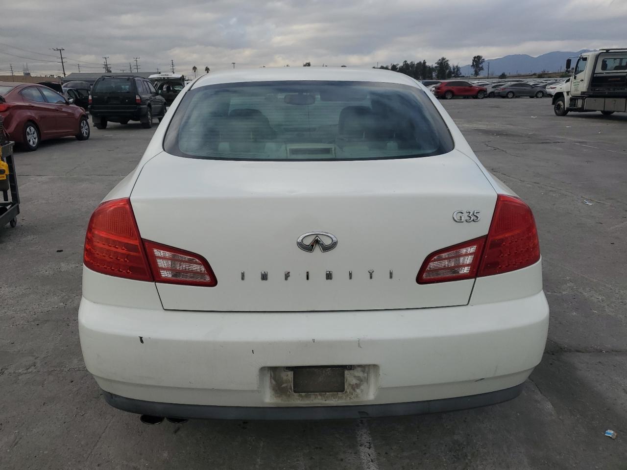 2003 Infiniti G35 VIN: JNKCV51E53M302739 Lot: 84971684