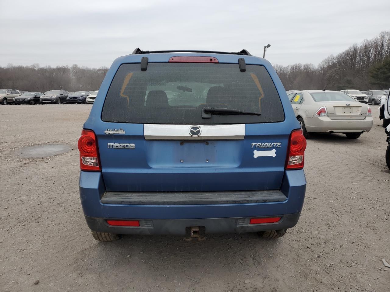 2009 Mazda Tribute I VIN: 4F2CZ02719KM01331 Lot: 86583234