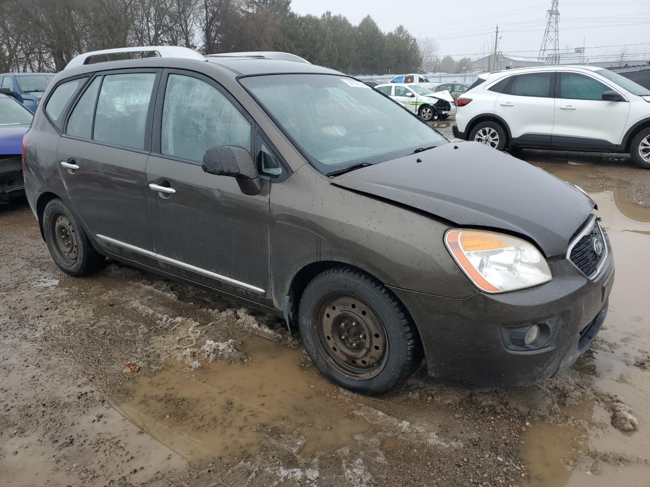 2011 Kia Rondo VIN: KNAHH8C60B7330688 Lot: 84500314