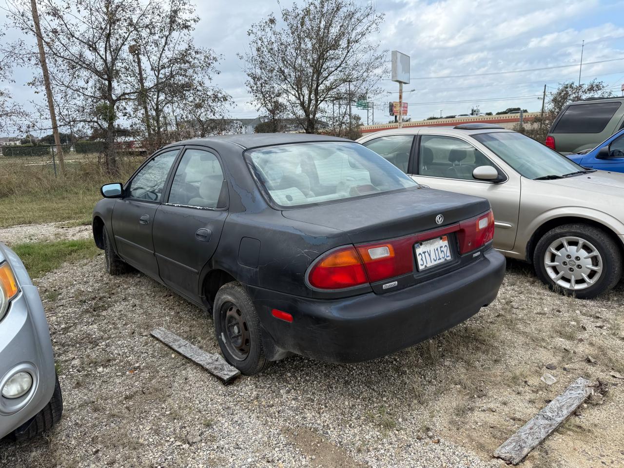 1995 Mazda Protege Dx VIN: JM1BA1419S0100163 Lot: 85915754