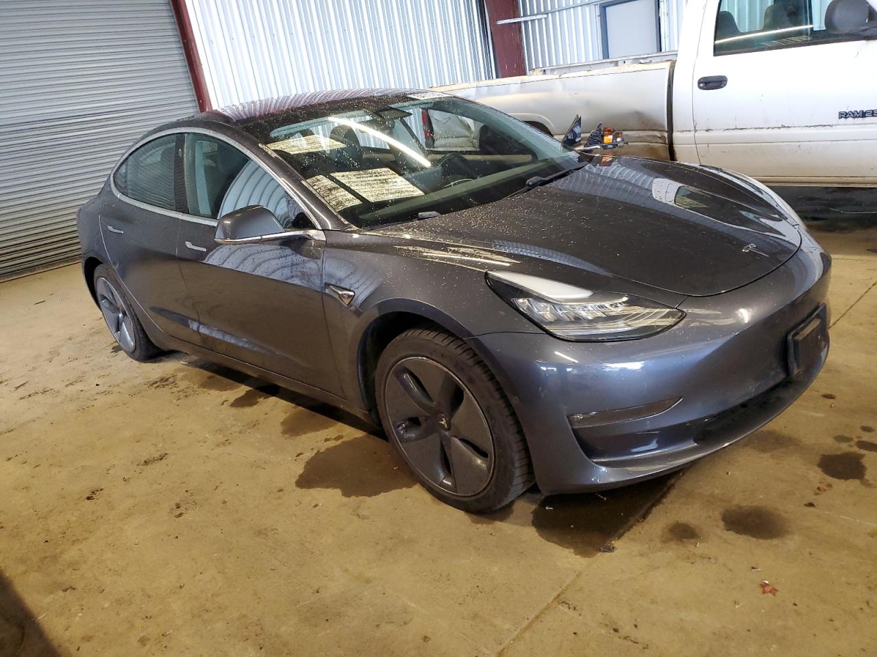 2018 Tesla Model 3 VIN: 5YJ3E1EA9JF002855 Lot: 84117394